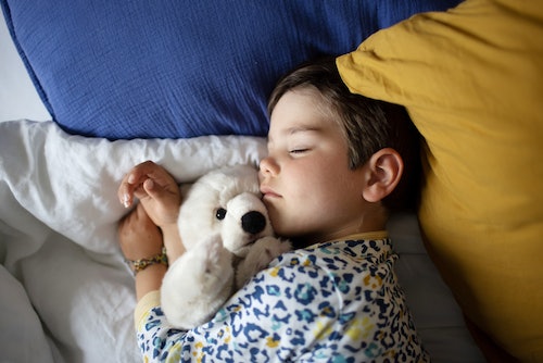 When Can A Baby Sleep With A Stuffed Animal? A Sleep Specialist Explains
