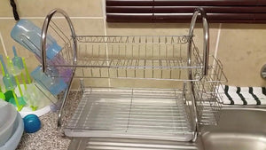 Use your old dish rack to save space in your cuboard instead of throwing it away