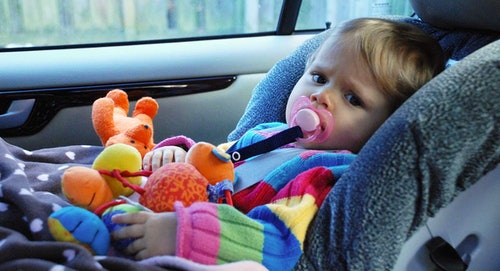 5 Tricks To Get An Uncooperative Toddler Into Their Car Seat